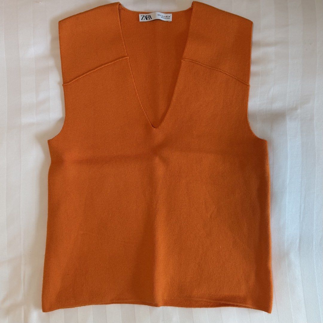 Zara Orange Knit Top (Category: Sleeveless) located in Makati City. Submitted by agl.ph (Listing ID 1465064656, Image 2). Description: Used twice at most .