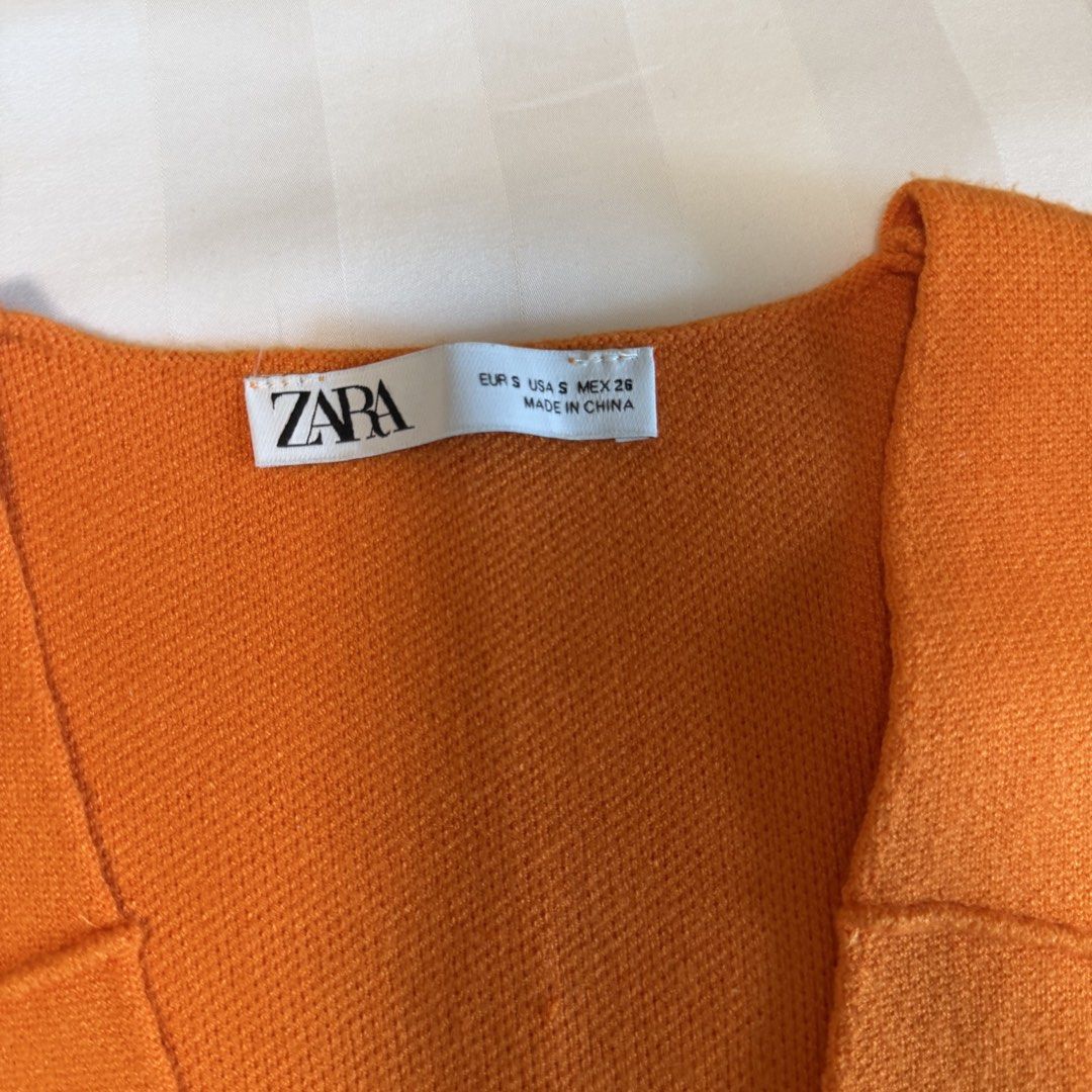 Zara Orange Knit Top (Category: Sleeveless) located in Makati City. Submitted by agl.ph (Listing ID 1465064656, Image 3). Description: Used twice at most .