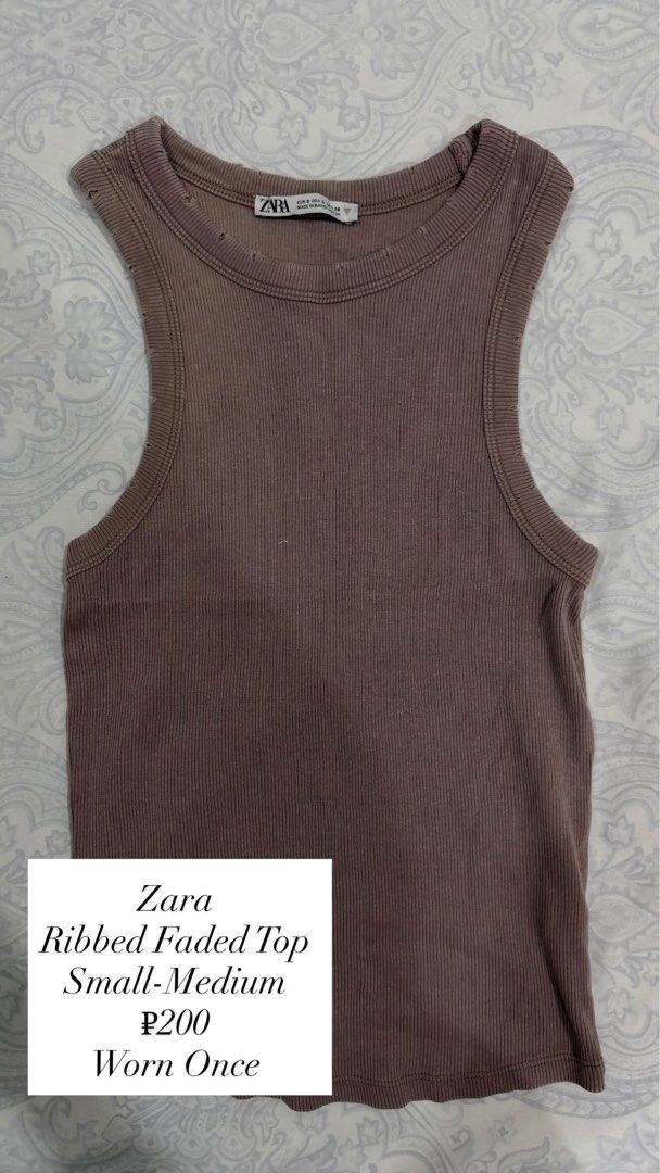 Zara Ribbed Faded Top (Category: Sleeveless) located in Davao. Submitted by tswizzleeess (Listing ID 1465156569, Image 1). Description: Zara Soft knit with distressed neckline and armholes Fits Small to Medium Worn once only. Message me for detailed photos if you want! ☺️ RFS: Decluttering 📍Davao City 💳 GCash, Bank Transfer (BDO) 📦 LBC, J&T SF shouldered by the buyer 😊.