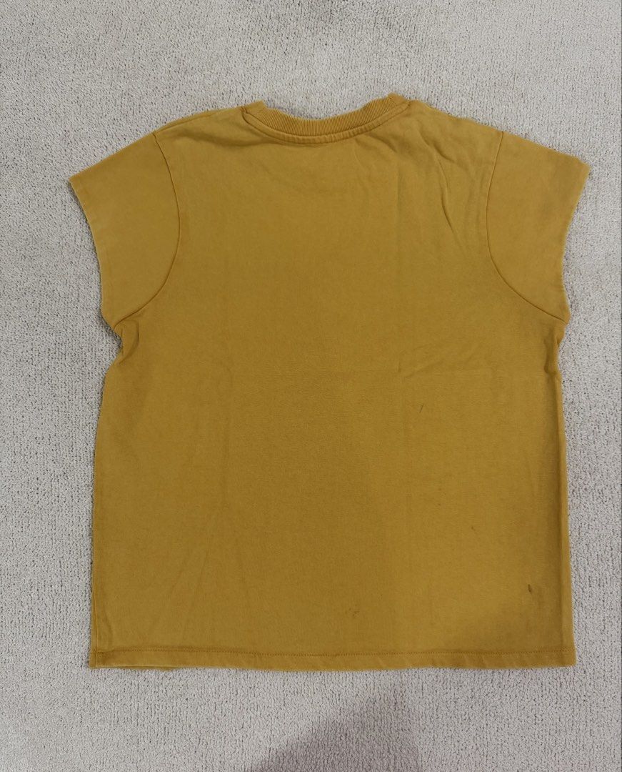 Zara Yellow Top M (Category: Shirts) located in Subic. Submitted by kittysclosetsale (Listing ID 1465031445, Image 2). Description: - Brand: Zara - Color: Mustard yellow - Size: M (EUR/USA M, MEX 28) - Material/Origin: Made in Bangladesh - Design: Classic crew neck with ribbed collar, short cap sleeves.