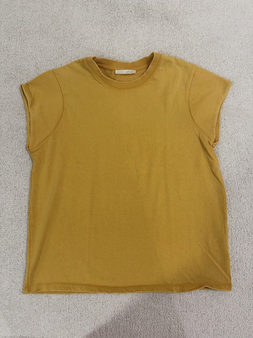 Zara Yellow Top M (Category: Shirts) located in Subic. Submitted by kittysclosetsale (Listing ID 1465031445, Image 1). Description: - Brand: Zara - Color: Mustard yellow - Size: M (EUR/USA M, MEX 28) - Material/Origin: Made in Bangladesh - Design: Classic crew neck with ribbed collar, short cap sleeves.