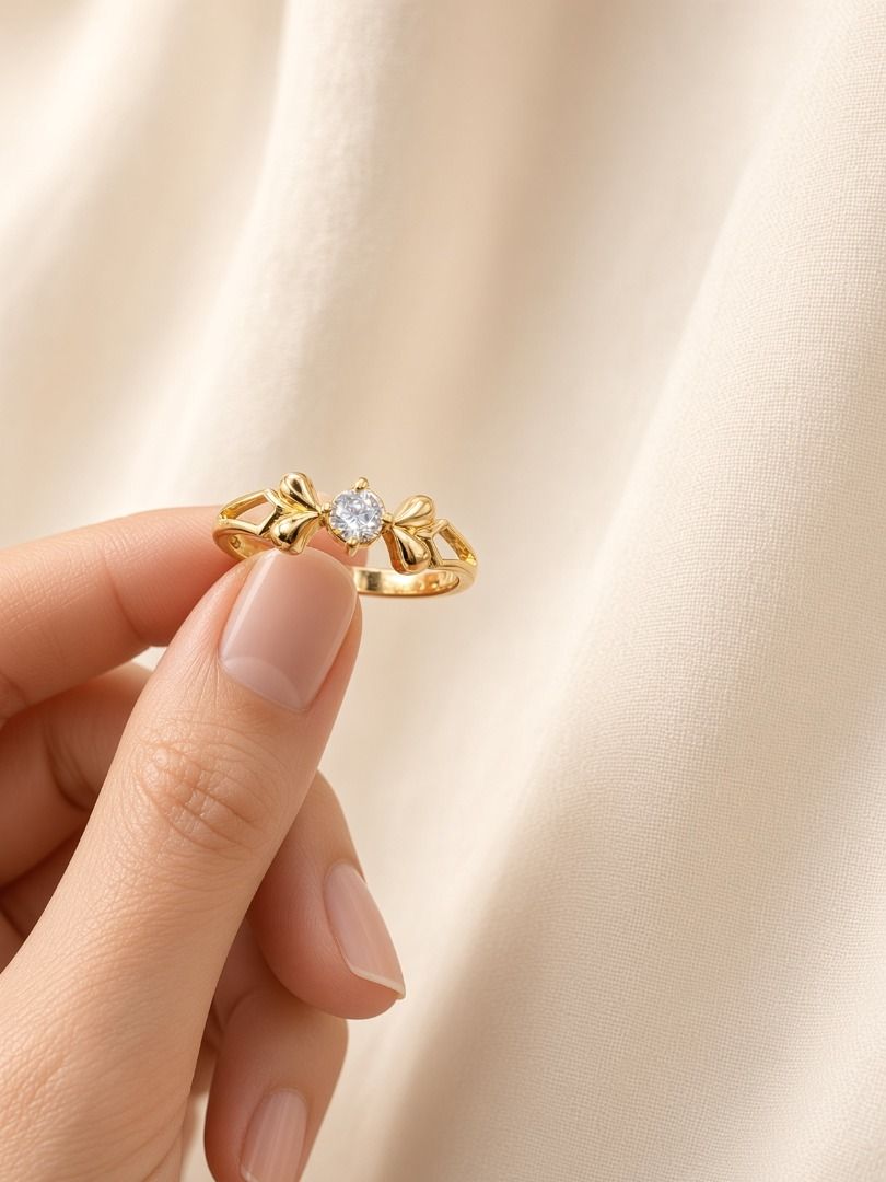 24K Gold Layered Bow Tie Ring - Size 5 (Category: Luxury Accessories) located in Quezon City. Submitted by ashlyn26 (Listing ID 1459581588, Image 3). Description: Bow Tie Ring - Size 5 The elegant ring features a Copper Alloy base layered with pure 24K gold — giving you the rich look of real gold without the high solid-gold price. Why you’ll love it: ✨ Non-tarnish – stays bright and beautiful longer ✨ Doesn’t fade easily – long-lasting gold shine