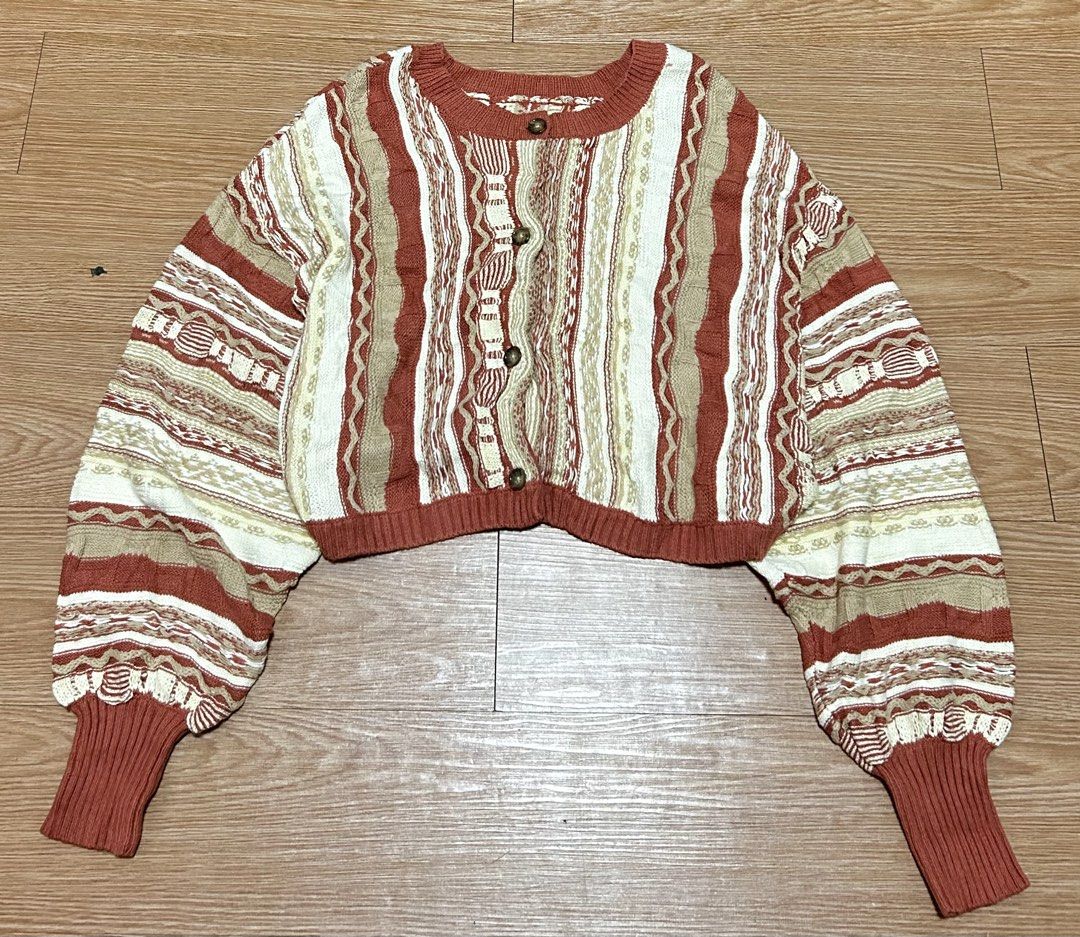 2way coogi vibes patterned multi color crop button down knitted cardigan bubble sleeves (Category: Coats, Jackets and Outerwear) located in Manila. Submitted by Zthriftclothes (Listing ID 1459603024, Image 1). Description: Can be worn front or back Beautiful Textured pattern Light and comfy to wear Very unique Bubble sleeves Excellent condition For womens only crop po ito 20W 19L .