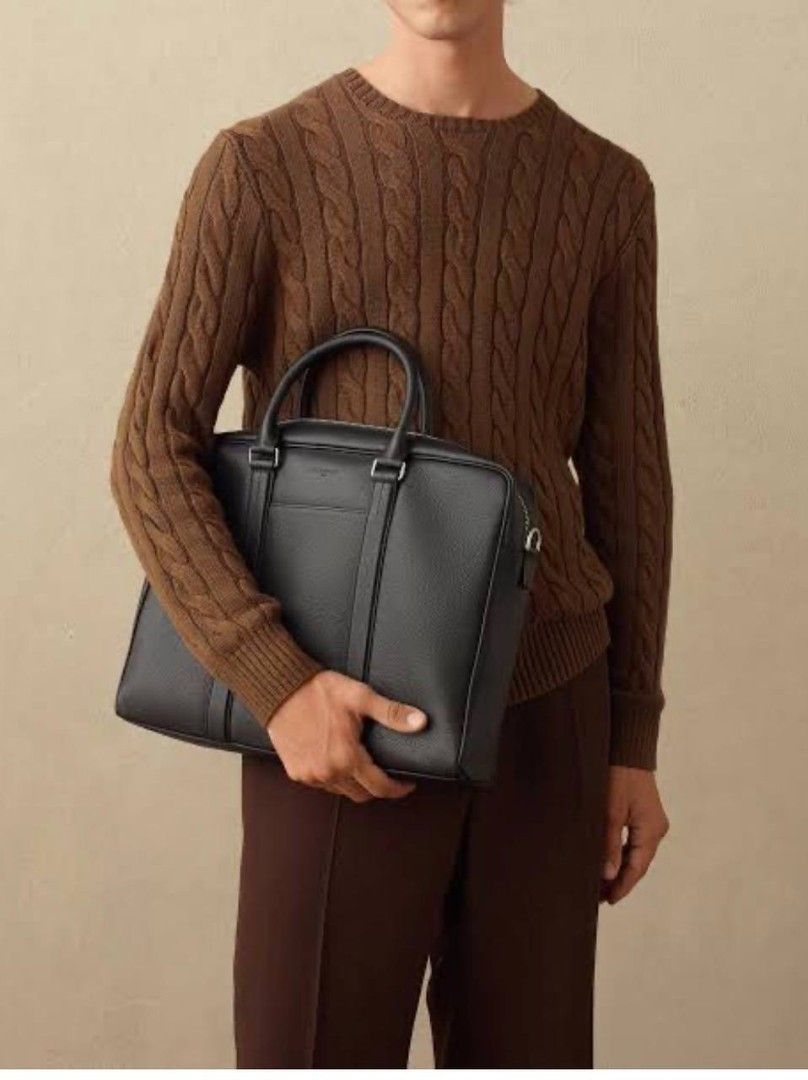 60% off Givenchy Paris Black Leather Briefcase (Category: Luxury Bags & Wallets) located in Manila. Submitted by rani143 (Listing ID 1459532484, Image 1). Description: - Genuine Givenchy Paris black pebbled leather briefcase - Secure zippered main compartment - Interior features multiple pockets and card slots - Durable, sturdy handles for comfortable carrying - Perfect for professional use or travel.
