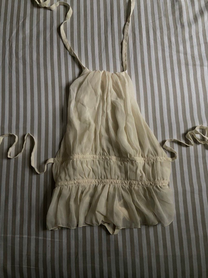 baby yellow backless halter top (xs) (Category: Blouses) located in Makati City. Submitted by louslyfits (Listing ID 1459561508, Image 1). Description: good condition used 2x xs bpi qr code payment delivery by jrs or grab.