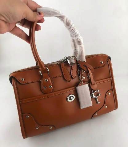 ☘️ CCH Rhyder Satchel Bag (Category: Cross-body Bags) located in Manila. Submitted by vera.prudence (Listing ID 1459513133, Image 2). Description: ☘️ CCH Rhyder Satchel Bag 24x16x8.5cm P2,300 Actual Photo Plus SF.