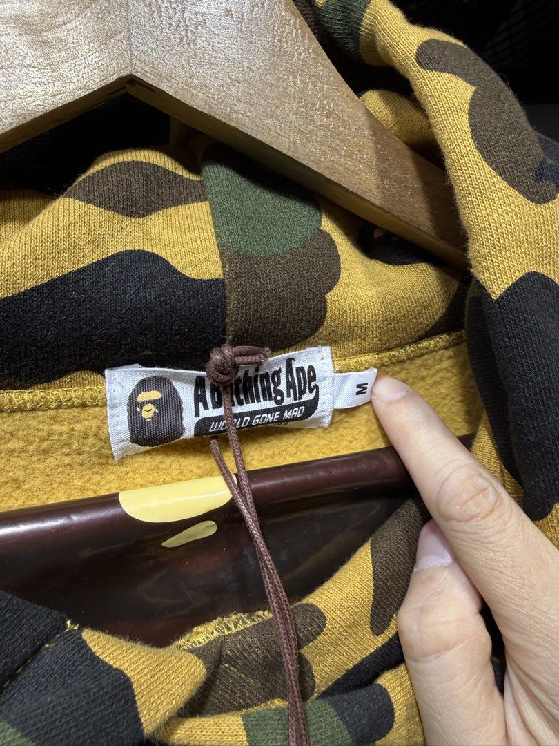 A Bathing Ape 1st camo pullover hoodie yellow camo (Category: Coats, Jackets and Outerwear) located in Pasay City. Submitted by fritz_kickz_2012 (Listing ID 1459515947, Image 2). Description: .