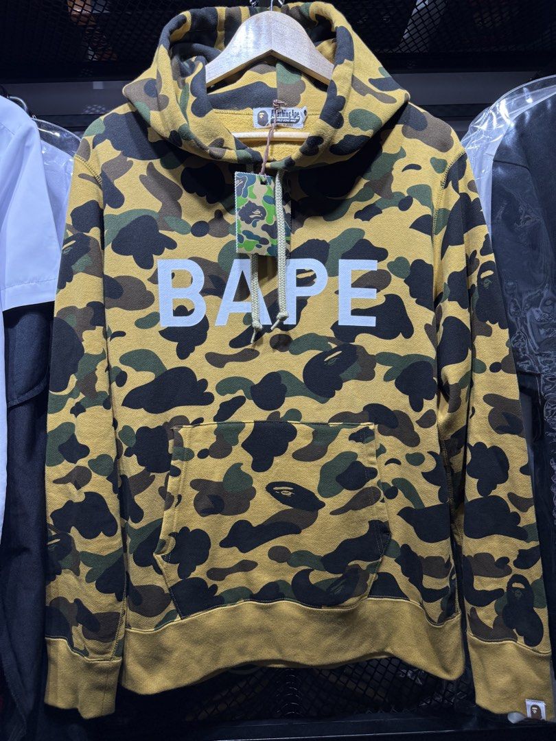 A Bathing Ape 1st camo pullover hoodie yellow camo (Category: Coats, Jackets and Outerwear) located in Pasay City. Submitted by fritz_kickz_2012 (Listing ID 1459515947, Image 1). Description: .