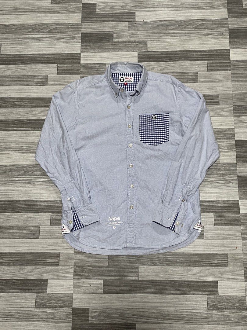 Aape Bathing Ape Polo Button down (Category: Activewear) located in Caloocan City. Submitted by thriftkidd2024 (Listing ID 1459649891, Image 1). Description: [ Aape Polo Button Down ] M on tag width: 19 length: 26.5 In excellent condition 9/10 color rate 850php Free shipping within Nationwide 🇵🇭 Plus Shipping fee in International 🌎 Taguig city, Metro Manila, PH 📍 DM TO PURCHASE 📥📥📥.
