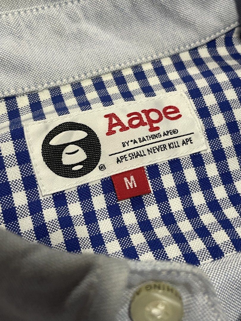 Aape Bathing Ape Polo Button down (Category: Activewear) located in Caloocan City. Submitted by thriftkidd2024 (Listing ID 1459649891, Image 3). Description: [ Aape Polo Button Down ] M on tag width: 19 length: 26.5 In excellent condition 9/10 color rate 850php Free shipping within Nationwide 🇵🇭 Plus Shipping fee in International 🌎 Taguig city, Metro Manila, PH 📍 DM TO PURCHASE 📥📥📥.