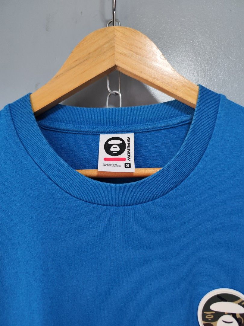 Aape Now Patch Logo Blue Tee (Category: Tshirts & Polo Shirts ) located in Bulacan. Submitted by emilj23 (Listing ID 1459595273, Image 3). Description: Aape Now Patch Logo Blue Tee Size S on tag L 27 W 21 Condition 9/10 Color rate 9/10 Issue Stain.