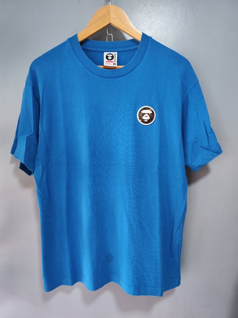 Aape Now Patch Logo Blue Tee (Category: Tshirts & Polo Shirts ) located in Bulacan. Submitted by emilj23 (Listing ID 1459595273, Image 1). Description: Aape Now Patch Logo Blue Tee Size S on tag L 27 W 21 Condition 9/10 Color rate 9/10 Issue Stain.