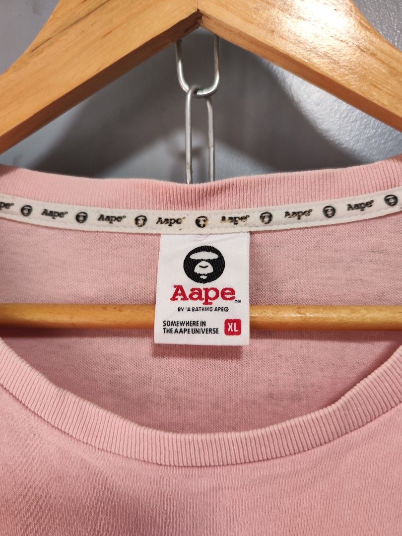Aape Universe Pink Tee (Category: Tshirts & Polo Shirts ) located in Bulacan. Submitted by emilj23 (Listing ID 1459595120, Image 3). Description: Aape Universe Pink Tee Size XL on tag L 30 W 23 Condition 9/10 Color rate 9/10 Issue Crackprints,Stains,Pinhole.