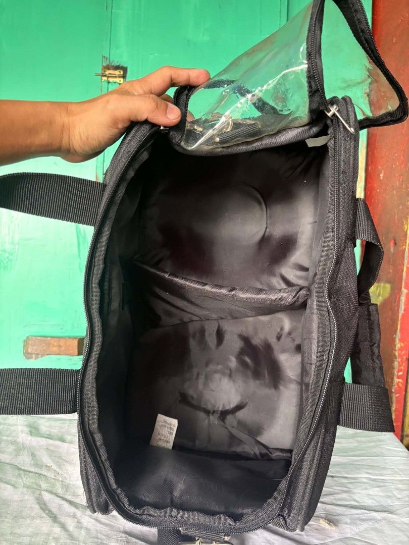 ABS Pro-Am Duffle Bag with Wheels (Category: Billiards and Bowling) located in Quezon City. Submitted by jpnvintageonline (Listing ID 1459652771, Image 2). Description: - Black PRO-AM duffle bag - Features wheels for easy transport - Top handles and detachable shoulder strap - Wide-opening main compartment - Internal clear zippered pocket - Ideal for travel or sports gear.