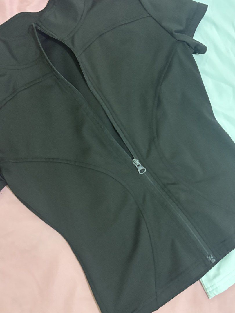 Activewear Top from Air Active (Bundle of 3) (Category: Activewear) located in Caloocan City. Submitted by tineq (Listing ID 1459531252, Image 3). Description: - Bundle of 3 activewear tops - White sleeveless tank with back cutout - Black short-sleeve zip-up jacket with contoured seams - Light blue short-sleeve tee with contoured seams - Comfortable and stretchy material - Ideal for workouts, casual wear, or sports Bought from AIR ACTIVE; RFS: de