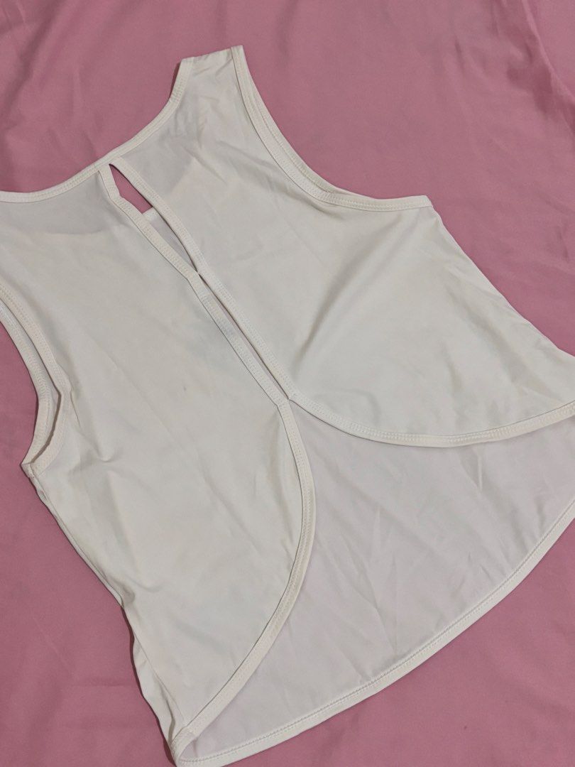 Activewear Top from Air Active (Bundle of 3) (Category: Activewear) located in Caloocan City. Submitted by tineq (Listing ID 1459531252, Image 2). Description: - Bundle of 3 activewear tops - White sleeveless tank with back cutout - Black short-sleeve zip-up jacket with contoured seams - Light blue short-sleeve tee with contoured seams - Comfortable and stretchy material - Ideal for workouts, casual wear, or sports Bought from AIR ACTIVE; RFS: de