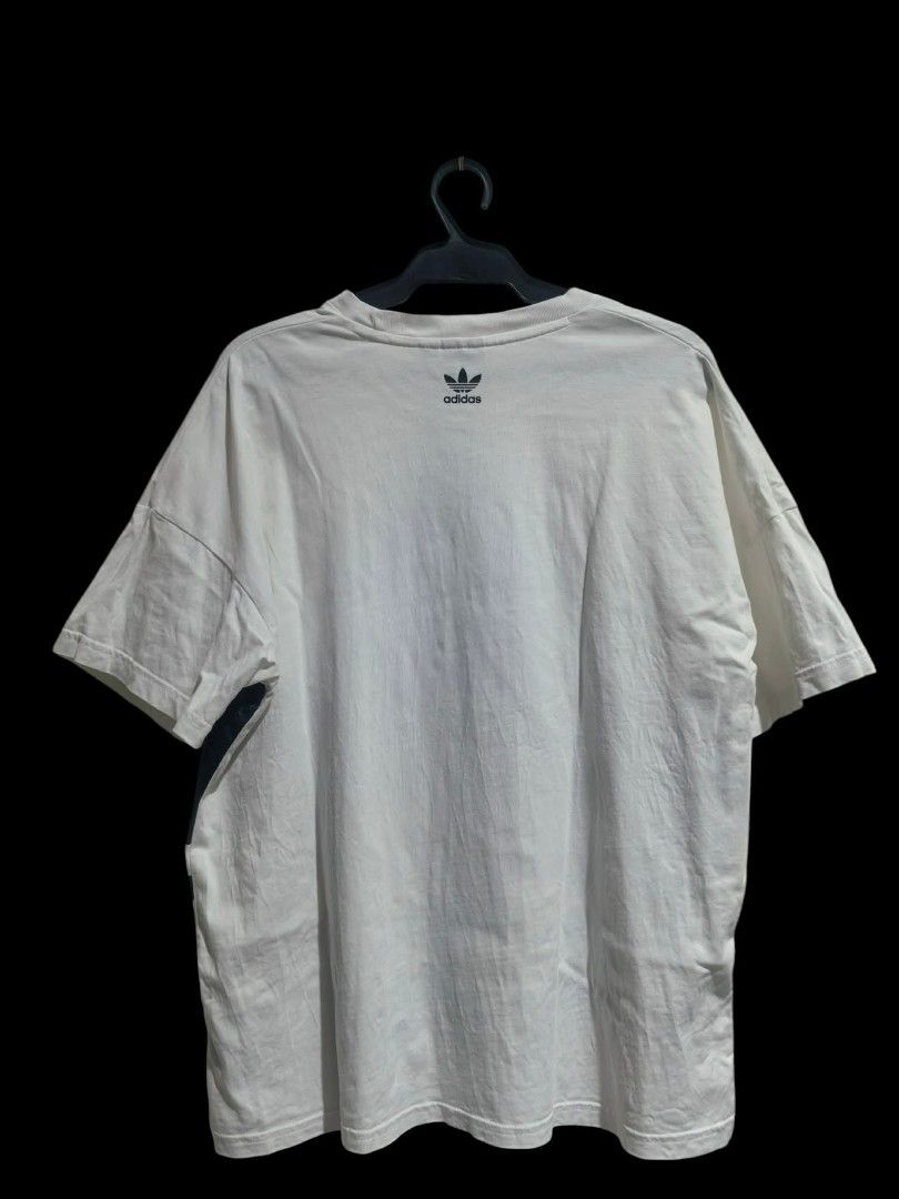 Adidas massive print shirt (Category: Activewear) located in Vinzons. Submitted by kspabico07187 (Listing ID 1459624233, Image 2). Description: Excellent condition No issue No stain no crack print L-26 W-22.5.