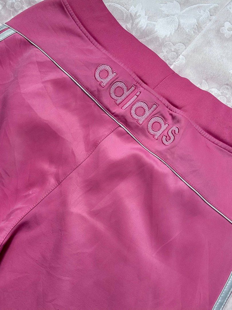 ADIDAS Pink 3-Stripe Track Pant (Category: Other Bottoms) located in San Fernando. Submitted by rianne_von (Listing ID 1459593115, Image 2). Description: Size XL on tag W: 14.2 in L: 39.5 in info: ✧ bright pink colorway w/ classic white 3-stripe detailing ✧ embroidered adidas branding + side pockets ✧ excellent thrifted condition; no holes, stains, or major flaws observed ✧ color may vary slightly due to lighting.