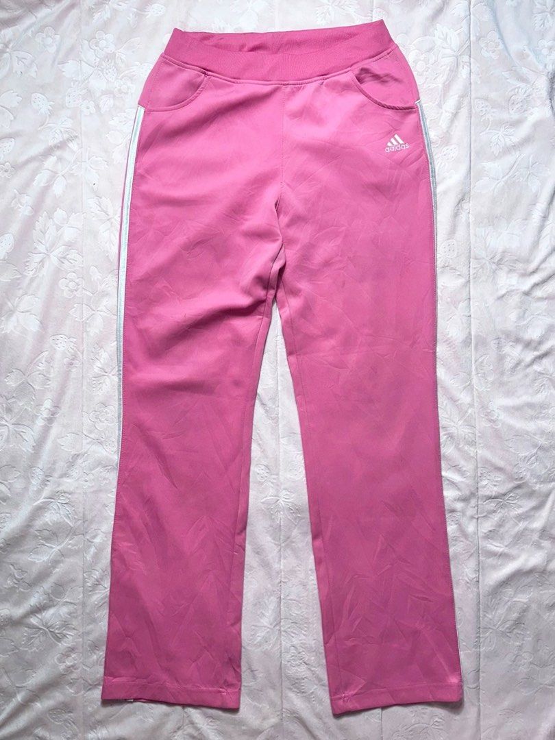 ADIDAS Pink 3-Stripe Track Pant (Category: Other Bottoms) located in San Fernando. Submitted by rianne_von (Listing ID 1459593115, Image 1). Description: Size XL on tag W: 14.2 in L: 39.5 in info: ✧ bright pink colorway w/ classic white 3-stripe detailing ✧ embroidered adidas branding + side pockets ✧ excellent thrifted condition; no holes, stains, or major flaws observed ✧ color may vary slightly due to lighting.