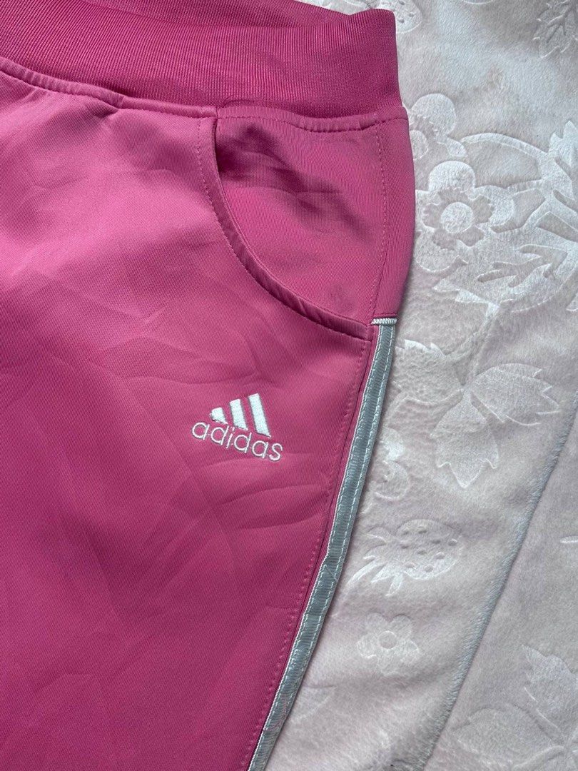 ADIDAS Pink 3-Stripe Track Pant (Category: Other Bottoms) located in San Fernando. Submitted by rianne_von (Listing ID 1459593115, Image 3). Description: Size XL on tag W: 14.2 in L: 39.5 in info: ✧ bright pink colorway w/ classic white 3-stripe detailing ✧ embroidered adidas branding + side pockets ✧ excellent thrifted condition; no holes, stains, or major flaws observed ✧ color may vary slightly due to lighting.