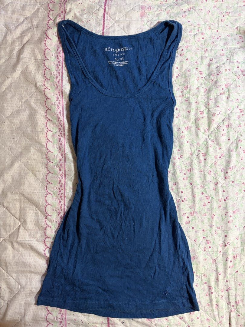 AEROPOSTLE Navy Blue Tank Top (Category: Sleeveless) located in Muntinlupa City. Submitted by herellas0504 (Listing ID 1459596147, Image 1). Description: AEROPOSTLE Navy Blue Tank Top Mine: 99 no issue, still in good condition small-large willing to keep!.