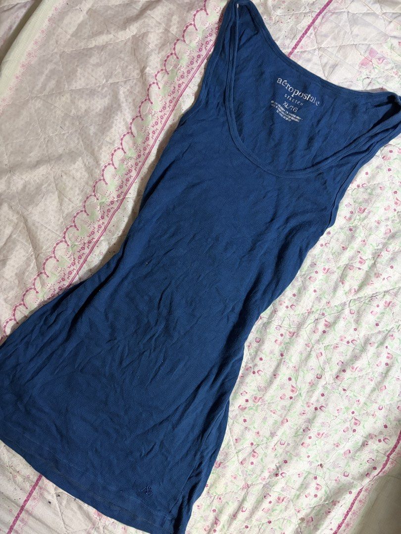 AEROPOSTLE Navy Blue Tank Top (Category: Sleeveless) located in Muntinlupa City. Submitted by herellas0504 (Listing ID 1459596147, Image 3). Description: AEROPOSTLE Navy Blue Tank Top Mine: 99 no issue, still in good condition small-large willing to keep!.