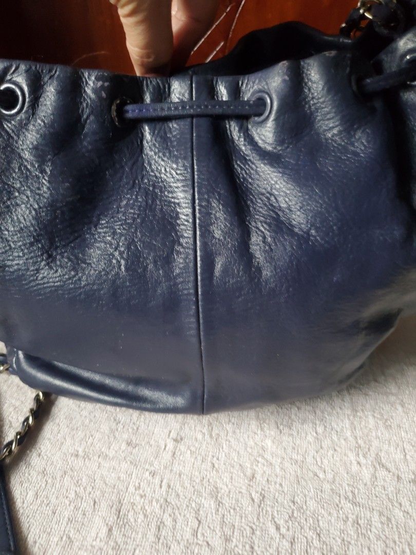 AGNES B. LEATHER DRAWSTRING CHAIN BAG (Category: Luxury Bags & Wallets) located in Manila. Submitted by smicolen (Listing ID 1459626201, Image 2). Description: - leather drawstring bag by Agnès b. - chain strap and hardware. - Spacious main compartment. - Interior zip pocket for secure storage. - Ideal for everyday wear. - Dimensions: 9.5" Length x 11.25" Width. - Bottom width: 3.5" issue - repaint ,signs of usage .