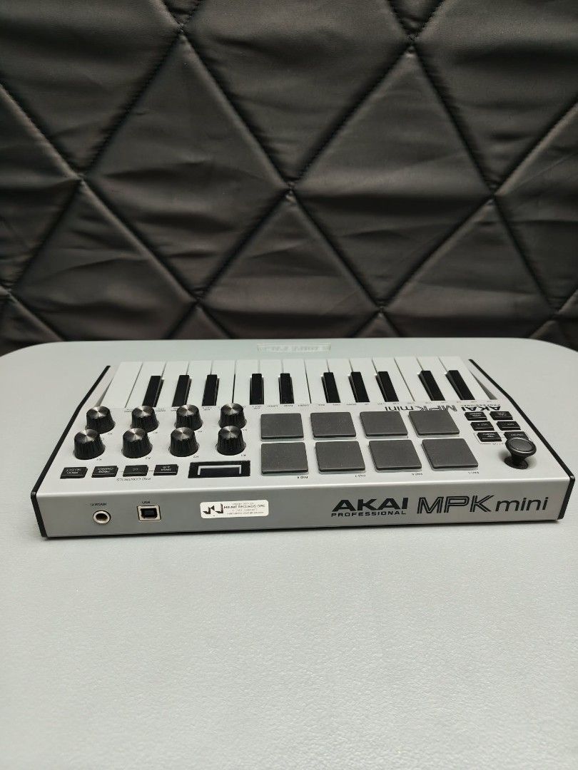 AKAI MPK Mini Professional MIDI Keyboard Controller (Category: Musical Instruments) located in Manila. Submitted by jimbo2003 (Listing ID 1459584798, Image 3). Description: - AKAI MPK Mini Professional MIDI Keyboard Controller - 25 velocity-sensitive keys - 8 MPC-style backlit drum pads - 8 assignable knobs for controlling parameters - 4 programmable memory banks - Perfect for music production and beatmaking - In excellent working condition.