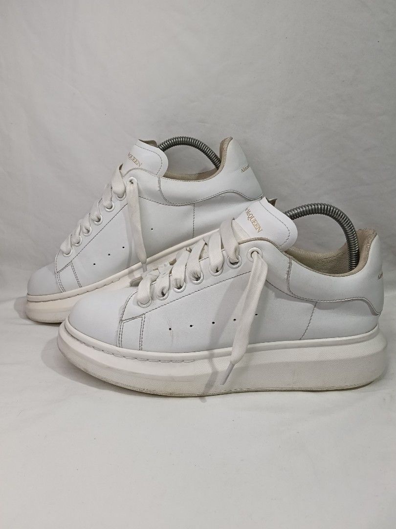 Alexander McQueen Oversized Sneakers White Leather FREE SHIP (Category: Sneakers) located in San Pedro. Submitted by jacb19 (Listing ID 1459528306, Image 3). Description: - Classic white leather Alexander McQueen oversized sneakers - Signature chunky sole size 42 - Gold Alexander McQueen branding on tongue and heel - White laces - Soles show some wear from use - Perfect statement shoes for any outfit Payment: PAYMENT FIRST Gotyme Shipping thru J&