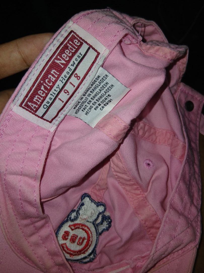 American Needle Chicago Cubs Pink Baseball Cap (Category: Caps & Hats) located in Manila. Submitted by cosmicturtle.d1b615 (Listing ID 1459554776, Image 2). Description: - Pink baseball cap - Features Chicago Cubs logo - Brand: American Needle - Made in Bangladesh - Adjustable strap at the back - Perfect for any Cubs fan!.