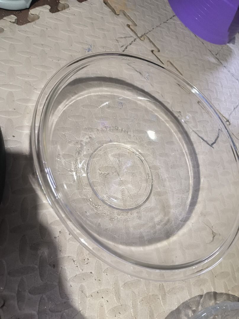 Anchor Hocking Glass Mixing Bowl (Category: Other Kitchenware & Tableware) located in Manila. Submitted by leivon (Listing ID 1459553823, Image 1). Description: - Anchor Hocking clear glass mixing bowl - Features classic concentric circle pattern on the bottom - Sturdy and durable for long-lasting use - Ideal size for mixing ingredients - A great addition to any kitchen.