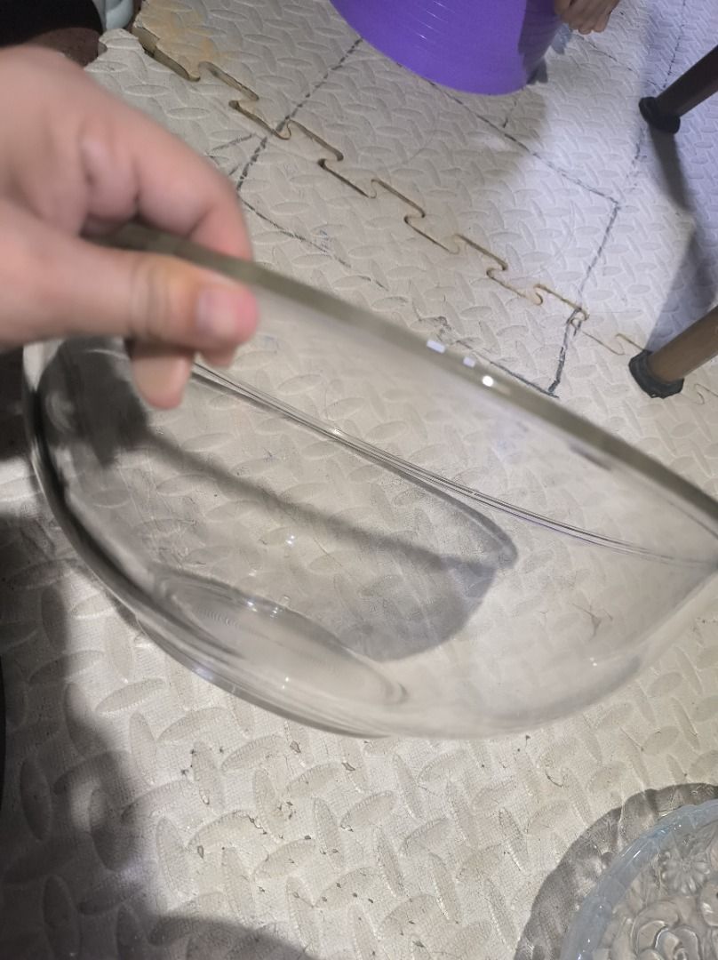 Anchor Hocking Glass Mixing Bowl (Category: Other Kitchenware & Tableware) located in Manila. Submitted by leivon (Listing ID 1459553823, Image 2). Description: - Anchor Hocking clear glass mixing bowl - Features classic concentric circle pattern on the bottom - Sturdy and durable for long-lasting use - Ideal size for mixing ingredients - A great addition to any kitchen.