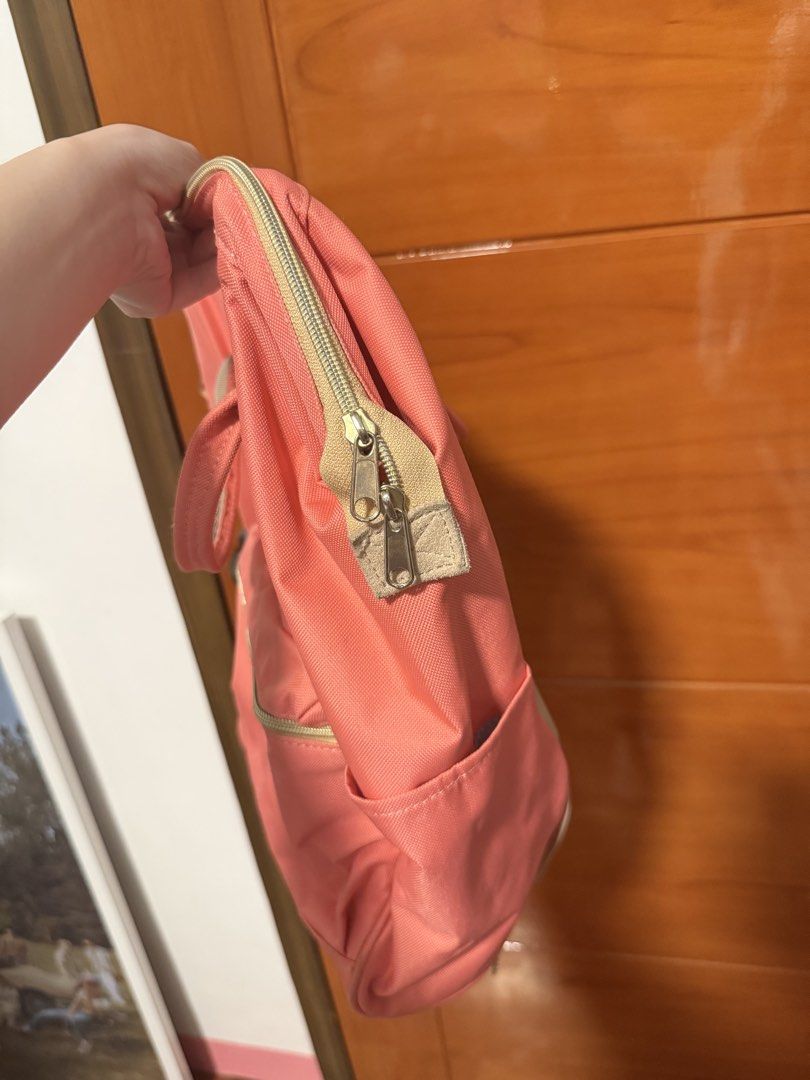 Anello Backpack Coral Pink (large) (Category: Backpacks) located in Balanga. Submitted by liiiizzzzzzzzz (Listing ID 1459536783, Image 3). Description: - coral pink Anello backpack - Main zip compartment - Front zip pocket - Side pockets - Adjustable straps - Minor marks on fabric (please check photos) - RFS: decluttering .