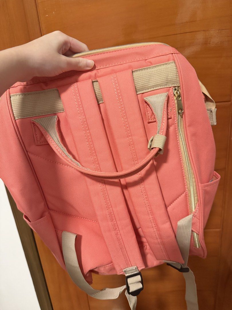 Anello Backpack Coral Pink (large) (Category: Backpacks) located in Balanga. Submitted by liiiizzzzzzzzz (Listing ID 1459536783, Image 2). Description: - coral pink Anello backpack - Main zip compartment - Front zip pocket - Side pockets - Adjustable straps - Minor marks on fabric (please check photos) - RFS: decluttering .