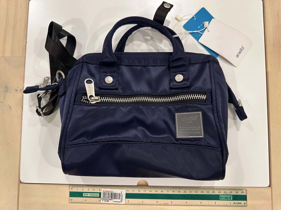 Anello Sabrina 2-Way Shoulder Bag (Category: Shoulder Bags) located in Manila. Submitted by buys.korean (Listing ID 1459597668, Image 2). Description: Anello Sabrina 2-Way Shoulder Bag Tag still attached Design: 2-way style that functions as both a handbag and a crossbody or shoulder bag with the included strap. Length (Width): 27 cm (approx. 10.6in) Height: 27 cm (approx. 10.6 in) Depth (Gusset): 5 cm (approx. 2.0 in) Location: San Juan City.
