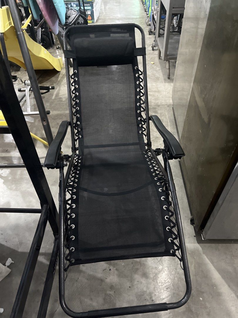 Anko Reclining Camp Chair - Black (Category: Chairs) located in Caloocan City. Submitted by hmr.gomez (Listing ID 1459560424, Image 1). Description: - Anko Black Reclining Camp Chair - Foldable for easy transport and storage - Includes a detachable pillow for added comfort - Seat height: 35cm - Perfect for camping and outdoor relaxation - Note: Minor damage on the right side elastic (as per receipt).