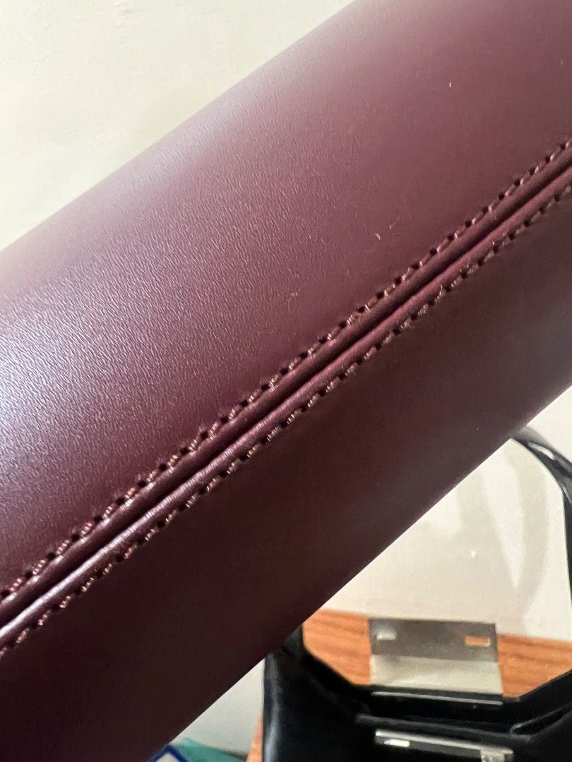 A.P.C. Burgundy Leather Shoulder Bag (Category: Shoulder Bags) located in Pasay City. Submitted by sharshay317 (Listing ID 1459597782, Image 2). Description: Burgundy leather shoulder bag from A.P.C. Features a half-moon shape with a zip closure. The strap has a gold buckle for adjustment. The leather has a nice sheen. Stitching details are clean and precise. A classic piece for everyday use. A slight scratch in the middle but not really noticeab