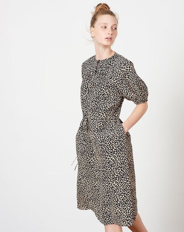 A.P.C. Leopard Print Midi Dress Size 40 (Category: Dresses) located in Caloocan City. Submitted by pumarenluc79160 (Listing ID 1459525910, Image 1). Description: - A.P.C. midi dress - Classic leopard print - Short puff sleeves - Tie waist for a flattering silhouette - Button-up front - Made in Bulgaria - Perfect for dressing up or down.