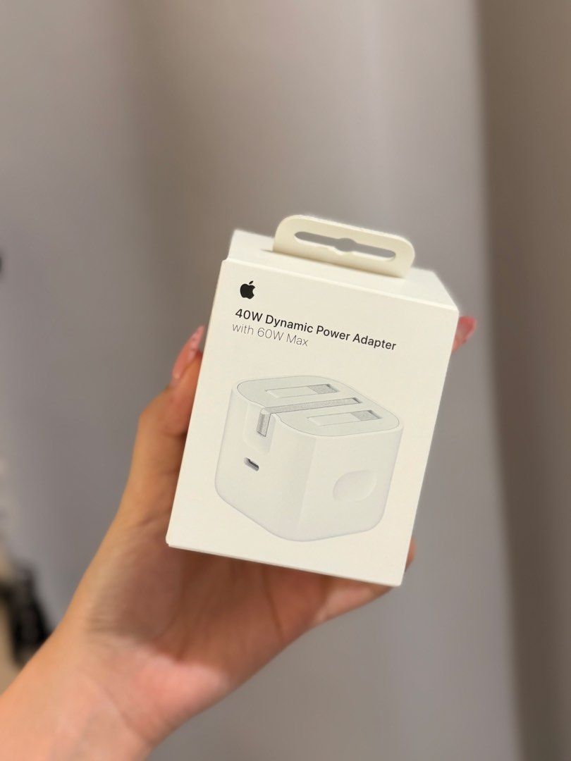 APPLE 40W DYNAMIC POWER ADAPTER (Category: Chargers & Cables) located in Bacoor. Submitted by nd.clothing (Listing ID 1459515461, Image 1). Description: Original from Hongkong.