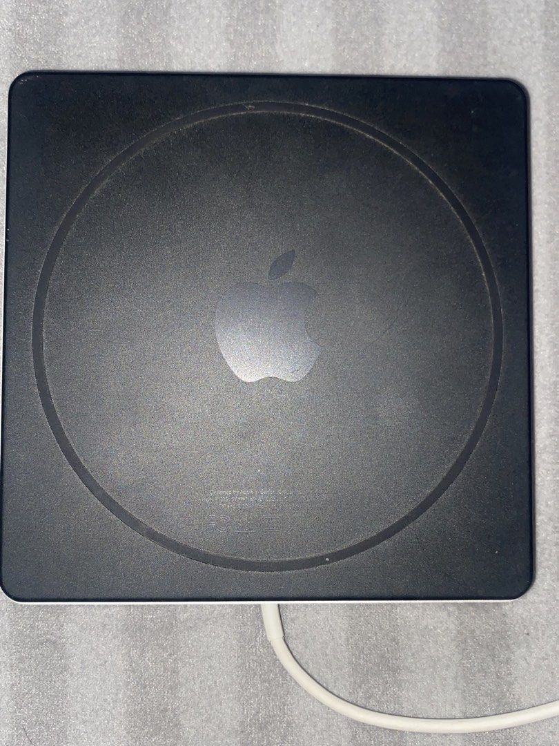 Apple SuperDrive DVD (Category: Other Accessories) located in Binangonan. Submitted by r0nb1nt5cat5co (Listing ID 1459671544, Image 2). Description: Compatible with Windows and MacOS. Minor dings along the edge of the unibody of dvd. Will provide a driver for Windows Compatibility since Windows not ready for plug and play..