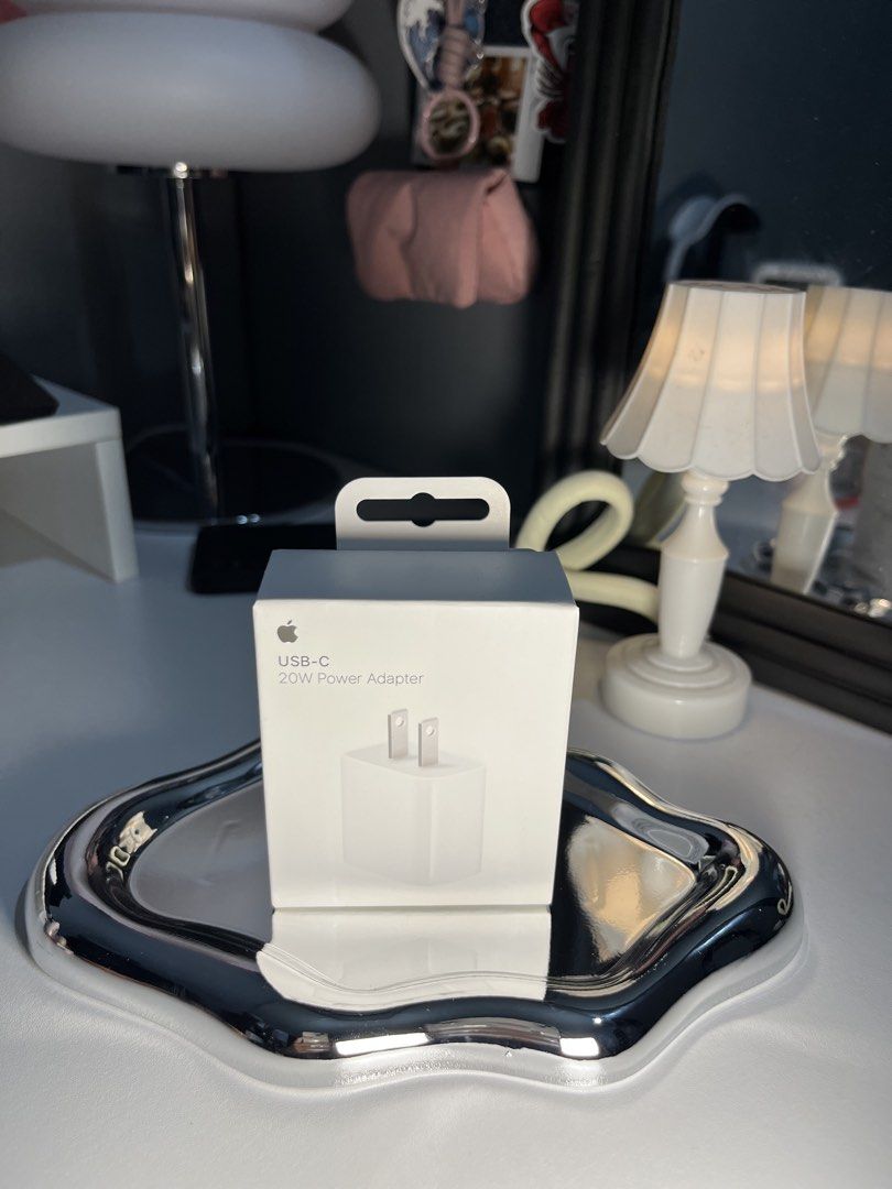 Apple USB-C 20W Power Adapter Charger (Category: Chargers & Cables) located in Dasmarinas. Submitted by chesnut97 (Listing ID 1459622346, Image 1). Description: - Genuine Apple USB-C 20W Power Adapter - Standard white color - Fast charging for iPhones and other USB-C compatible devices - Compact and portable design - Official Apple product.