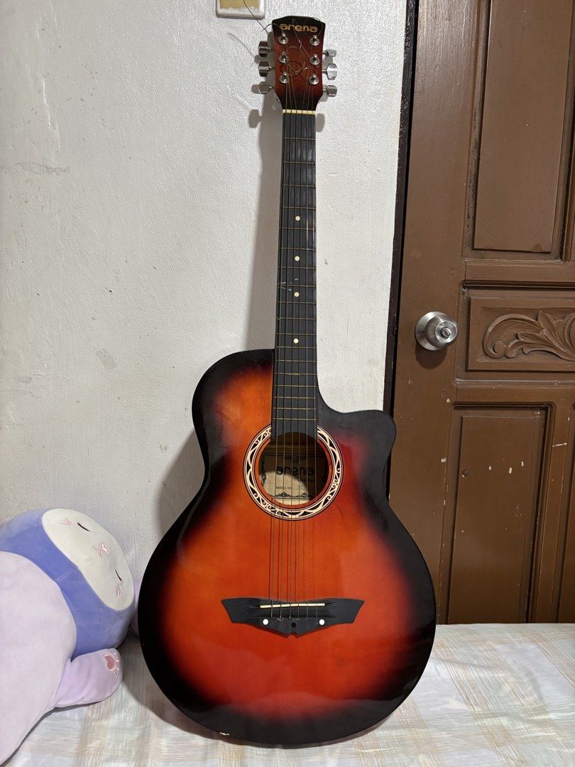 Arena Acoustic Guitar (Category: Musical Instruments) located in Manila. Submitted by vayoleto0206201 (Listing ID 1459579710, Image 1). Description: .