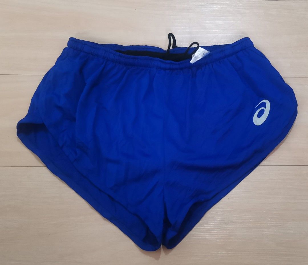 ASICS Blue Running Shorts with Inner Brief (Category: Activewear) located in Cavite. Submitted by nehlfab08 (Listing ID 1459531891, Image 1). Description: - Blue ASICS running shorts - Lightweight material for comfort - Elastic waistband with drawstring for a secure fit - Built-in brief for added support - Perfect for running and workouts - Features ASICS logo on the side.
