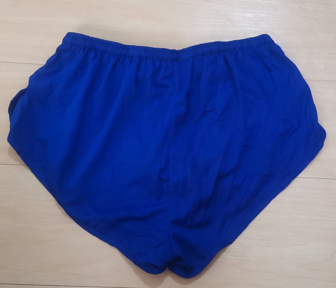 ASICS Blue Running Shorts with Inner Brief (Category: Activewear) located in Cavite. Submitted by nehlfab08 (Listing ID 1459531891, Image 2). Description: - Blue ASICS running shorts - Lightweight material for comfort - Elastic waistband with drawstring for a secure fit - Built-in brief for added support - Perfect for running and workouts - Features ASICS logo on the side.