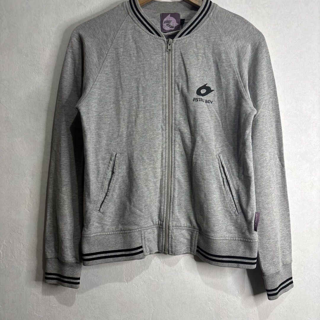 Astro Boy - Grey Bomber Jacket Tezuka Productions (Category: Coats, Jackets and Outerwear) located in Cavite. Submitted by goodstayojan.cvt (Listing ID 1459606111, Image 2). Description: Astroboy - Zipped Jacket M on tag(17.5 x 22.5) Verygood Condition No flaws! - Grey Astro Boy bomber jacket - Features iconic Astro Boy logo on the chest - Ribbed collar, cuffs, and hem with stylish black stripes - Convenient zipper closure - Officially licensed b