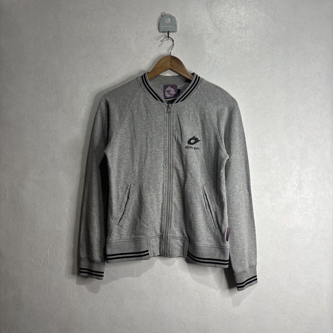 Astro Boy - Grey Bomber Jacket Tezuka Productions (Category: Coats, Jackets and Outerwear) located in Cavite. Submitted by goodstayojan.cvt (Listing ID 1459606111, Image 1). Description: Astroboy - Zipped Jacket M on tag(17.5 x 22.5) Verygood Condition No flaws! - Grey Astro Boy bomber jacket - Features iconic Astro Boy logo on the chest - Ribbed collar, cuffs, and hem with stylish black stripes - Convenient zipper closure - Officially licensed b