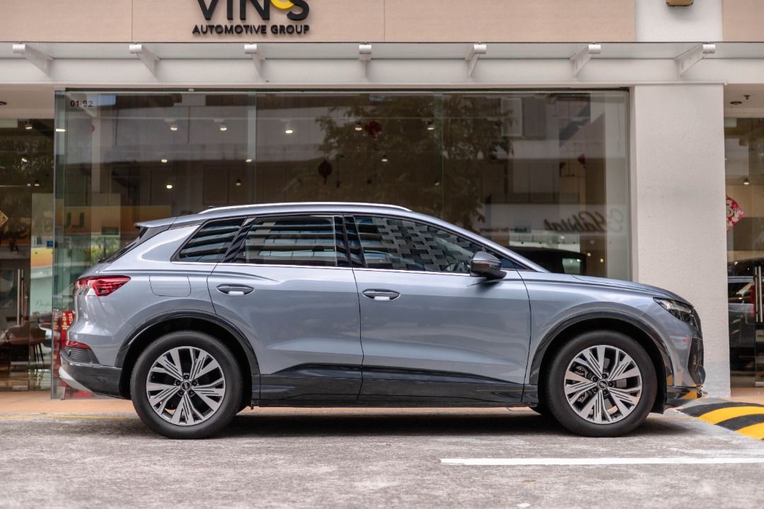 Audi Q4 e-tron Electric 45 Auto (Category: Used Cars) located in Singapore. Submitted by vinsautogroup (Listing ID 1459577335, Image 2). Description: Vehicle Features: 82 kWh, RWD. Electric motor producing 282bhp and 545nm torque. 2-stage planetary gearbox. Range 466km. 0 -100 Km/h in 6.7s. Accessories: 19" Audi rims, Adaptive Cruise Control, Sports front seats. LED headlamps & Rear combination lamp, Audi universal traffic recorder, Why Vin's Aut
