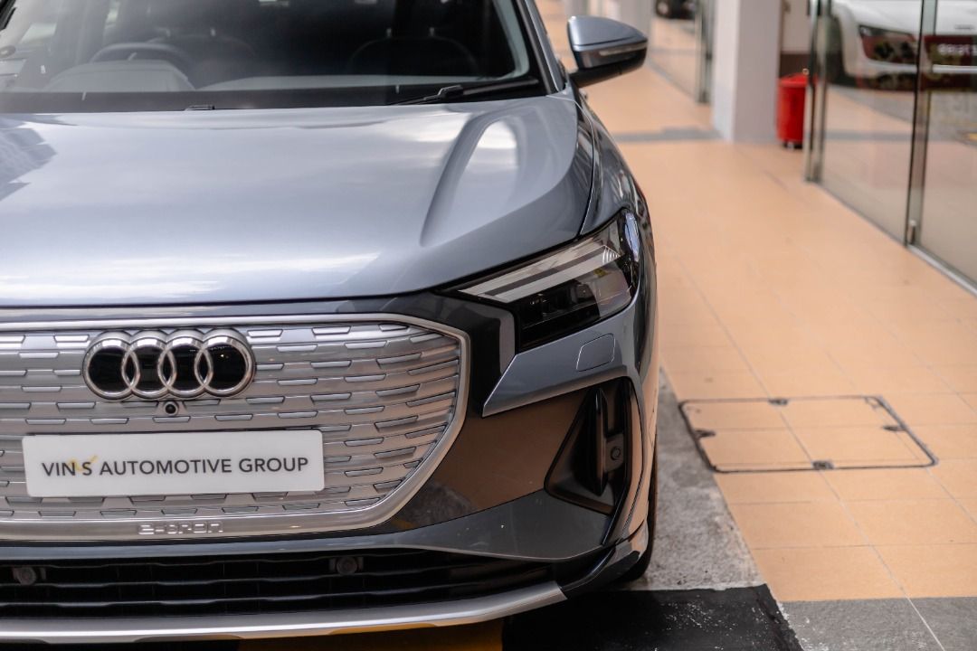 Audi Q4 e-tron Electric 45 Auto (Category: Used Cars) located in Singapore. Submitted by vinsautogroup (Listing ID 1459577335, Image 3). Description: Vehicle Features: 82 kWh, RWD. Electric motor producing 282bhp and 545nm torque. 2-stage planetary gearbox. Range 466km. 0 -100 Km/h in 6.7s. Accessories: 19" Audi rims, Adaptive Cruise Control, Sports front seats. LED headlamps & Rear combination lamp, Audi universal traffic recorder, Why Vin's Aut