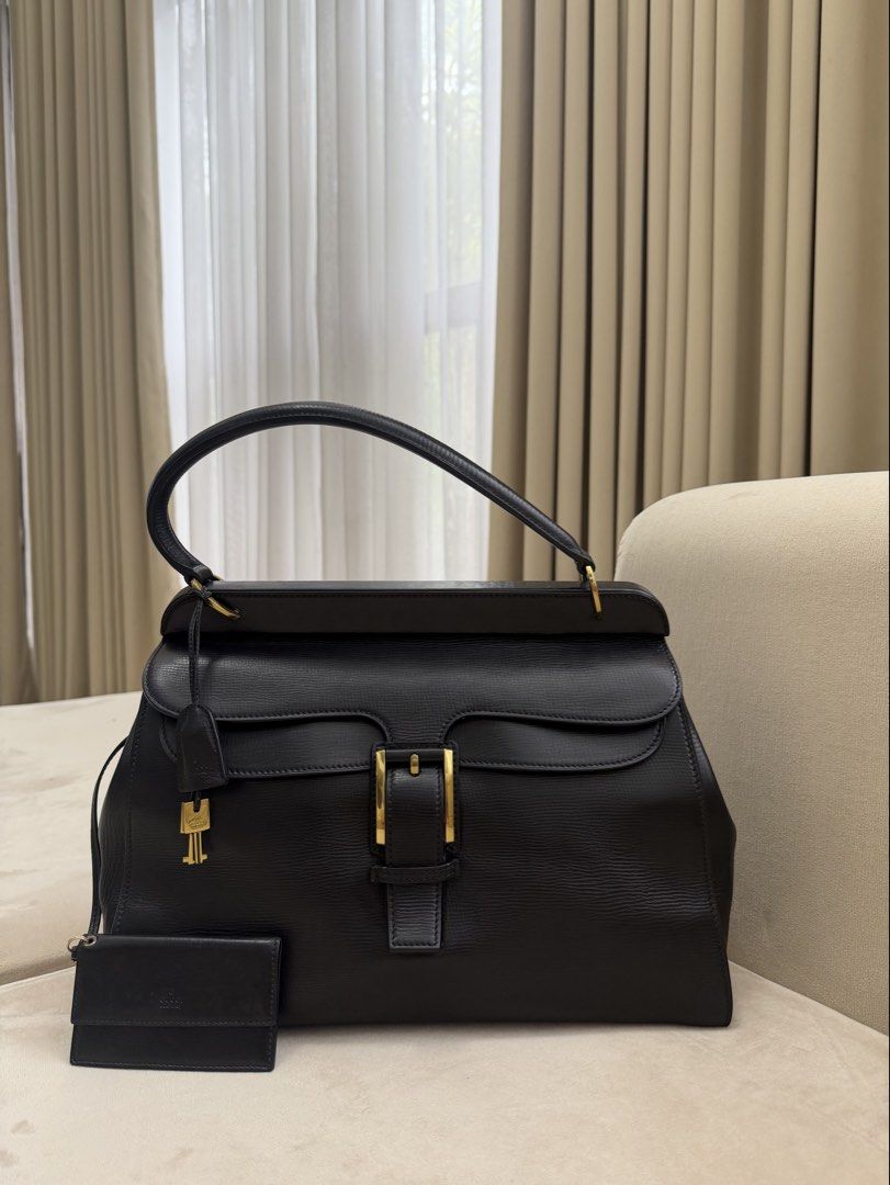 Authentic Gucci Leather “Kelly” Handbag (Category: Luxury Bags & Wallets) located in Manila. Submitted by maria_2326 (Listing ID 1459517352, Image 2). Description: Gucci Leather Double Flap Top Handle Bag | “Kelly” Bag Guarantee Authentic With pouch, key and chochette only Location: Manila/QC.