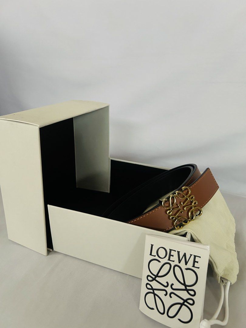Authentic Loewe Reversible Anagram Leather Belt (Category: Belts) located in Quezon City. Submitted by carmi.md (Listing ID 1459524502, Image 1). Description: - Authentic Loewe Reversible Anagram belt in smooth calfskin bought from Shangri-la mall - Color: Tan / Black - Buckle: Gold Anagram - Size: 80 / 32 , 2.8cm wide - No defects, no creases, no stains - Inclusions: Original Box, Dust Bag, Authenticity Card, Original Paper bag RFS: Decluttering